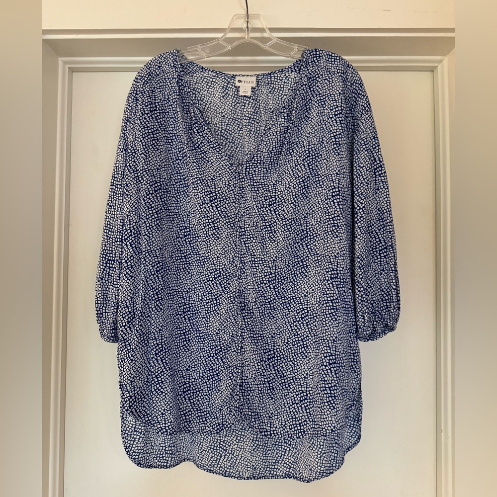 Stylus blue with white dots high-low blouse